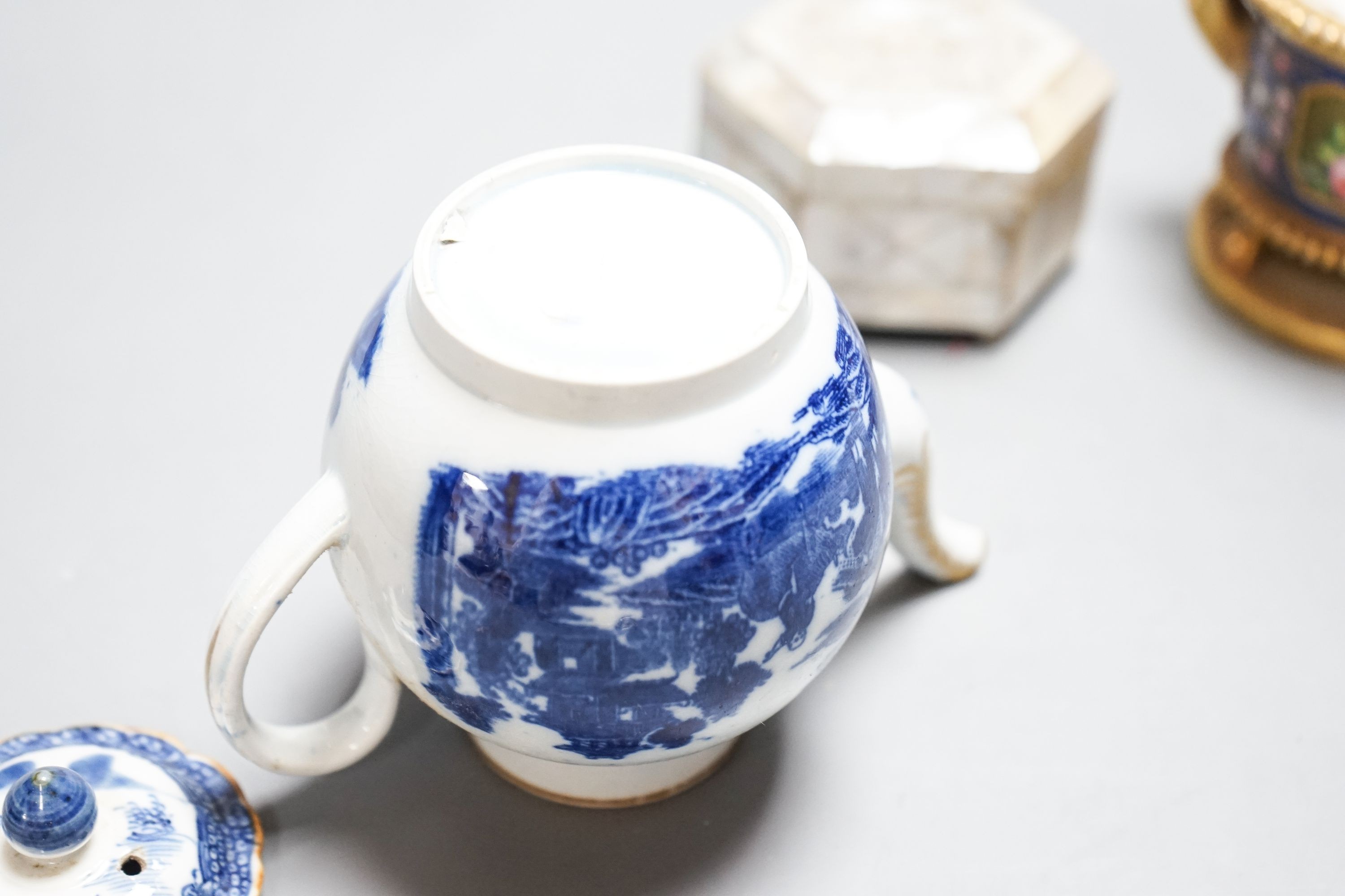 A Schoelcher Paris porcelain inkwell on stand, an 18th blue and white miniature teapot and a hexagonal mother of pearl lidded box (3)